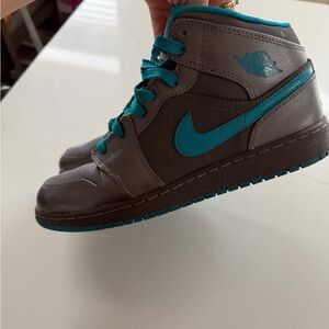 Nike Air Jordan 1 Mid GG in the "Dark Grey/Teal" colorway 7Y